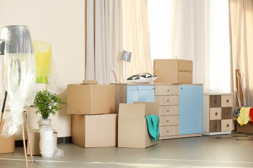 Putney Storage staff handling items safely in a secure facility