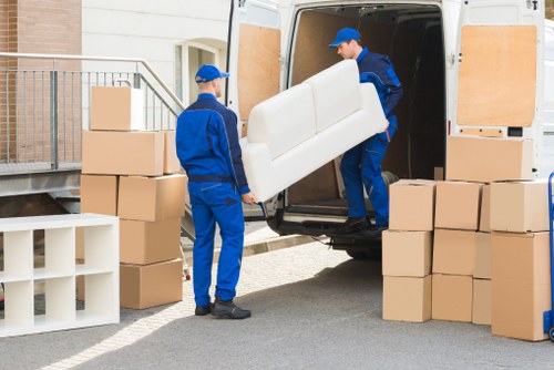Office relocation planning in Putney with business moving boxes