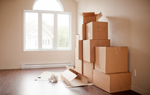 Organized storage unit in Putney with boxes and furniture
