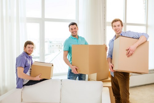 Packed moving boxes ready for removals in Putney